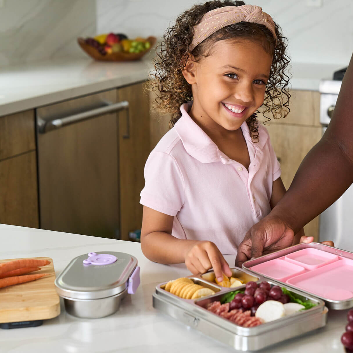 Family prepare lunch for school using Good Bare stainless steel lunch box